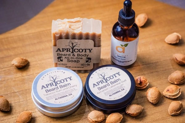 Apricoty shaving and beard care products including beard oil and grooming tins